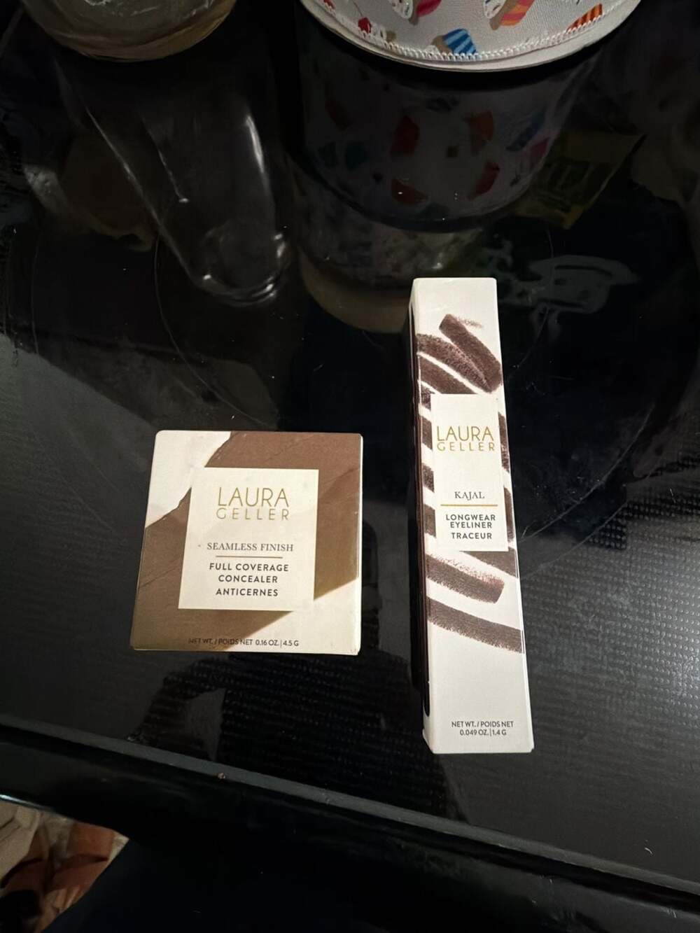 Laura Geller Seamless Finish Full Coverage Concealer in Deep and Kajal Longwear
